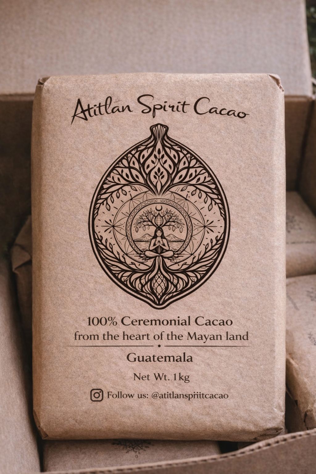 A block of Volcano Spirit ceremonial cacao wrapped in kraft paper